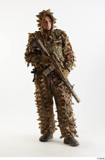 Frtankie Perry Standing with Gun in Ghillie holding gun standing…